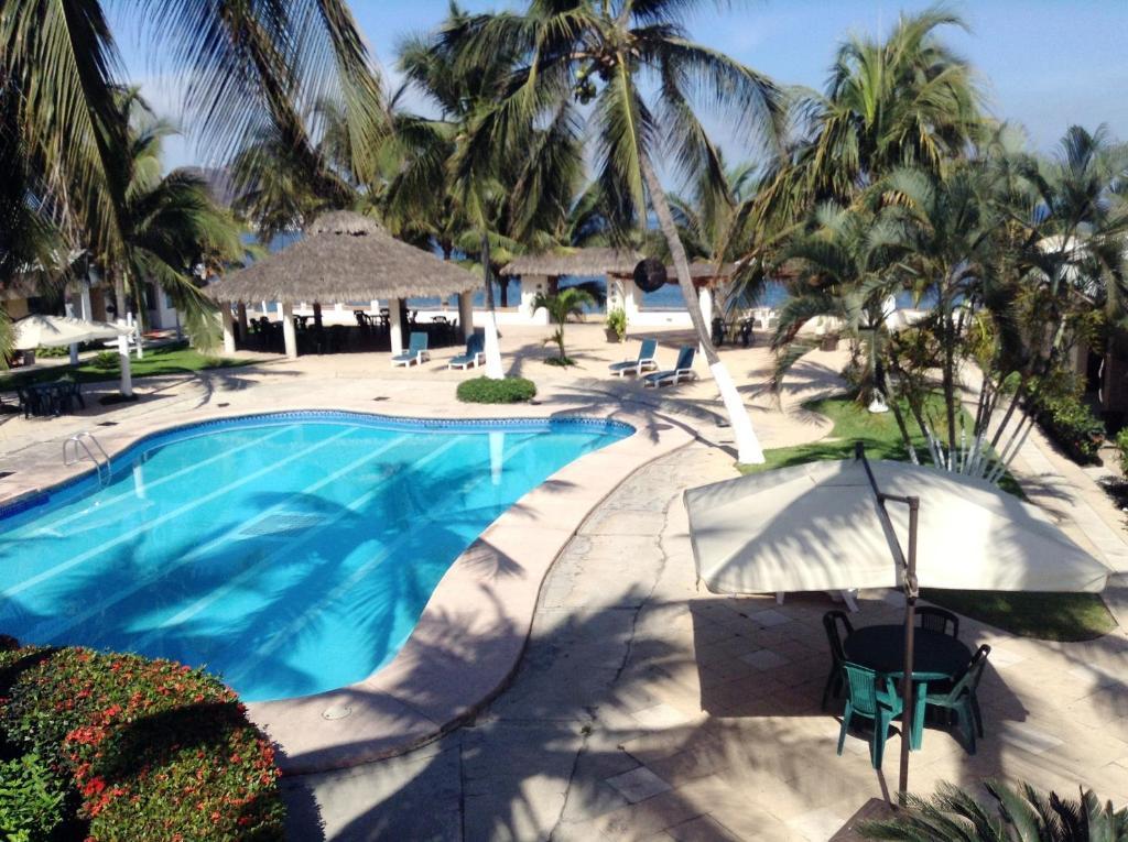Coral Pacifico Hotel Y Villas Manzanillo Bagian luar foto